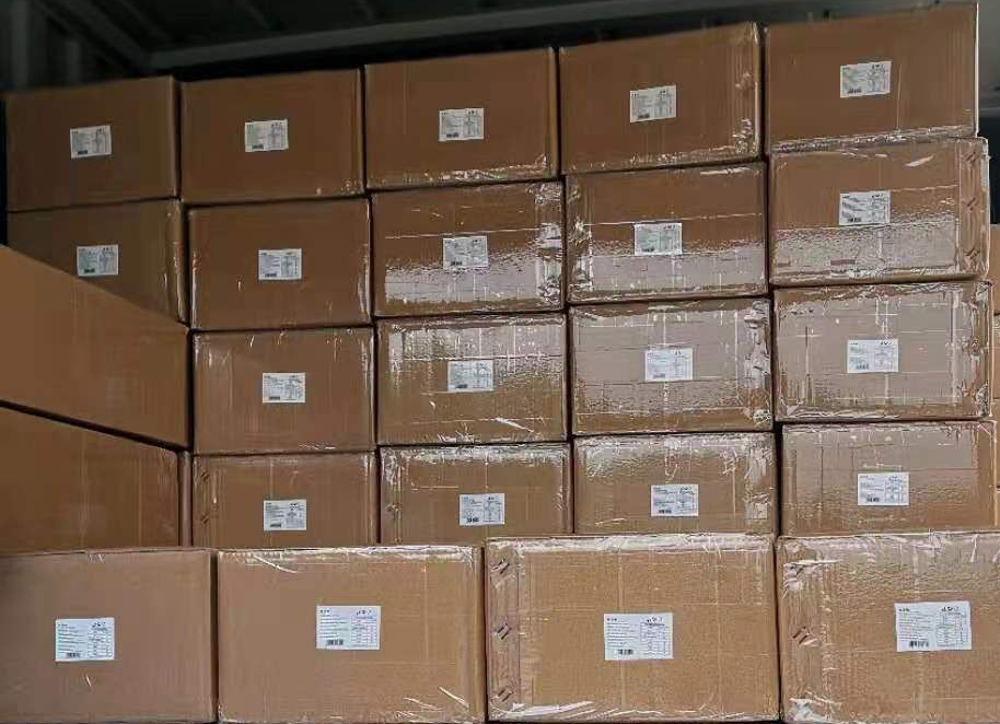 Stacked 12.5 kilogram matcha cartons prepared for commercial supply.