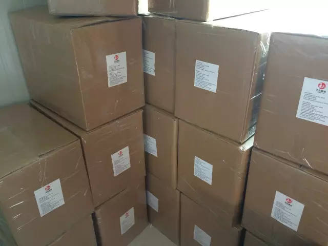 Twenty kilogram matcha cartons in the production partner packing area.
